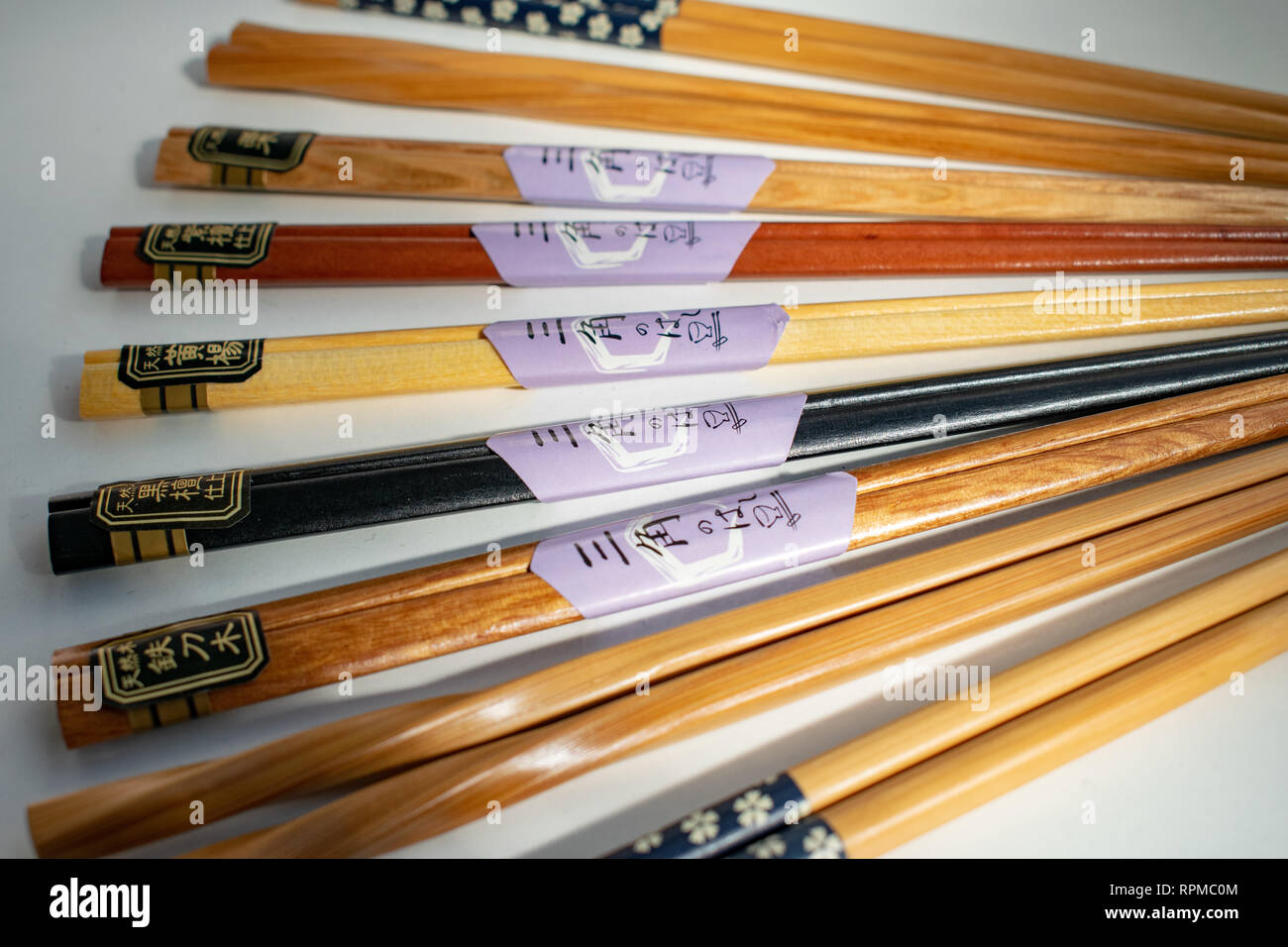a selection of chopsticks placed on display in a fan shape Stock Photo