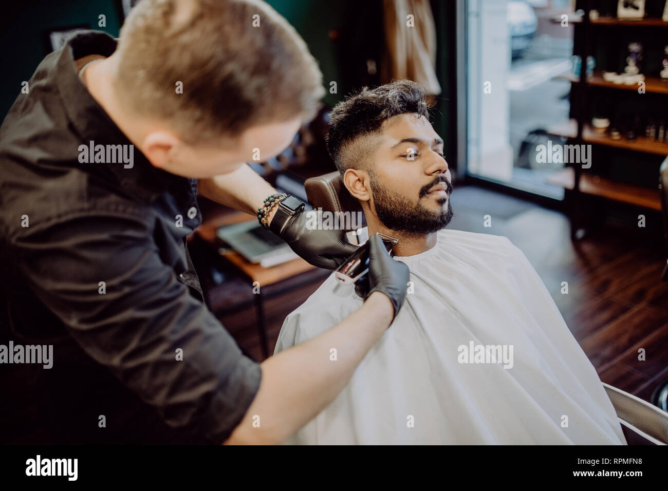 Beard Trimming Hand Of Barber With Trimmer How To Shape A Beard