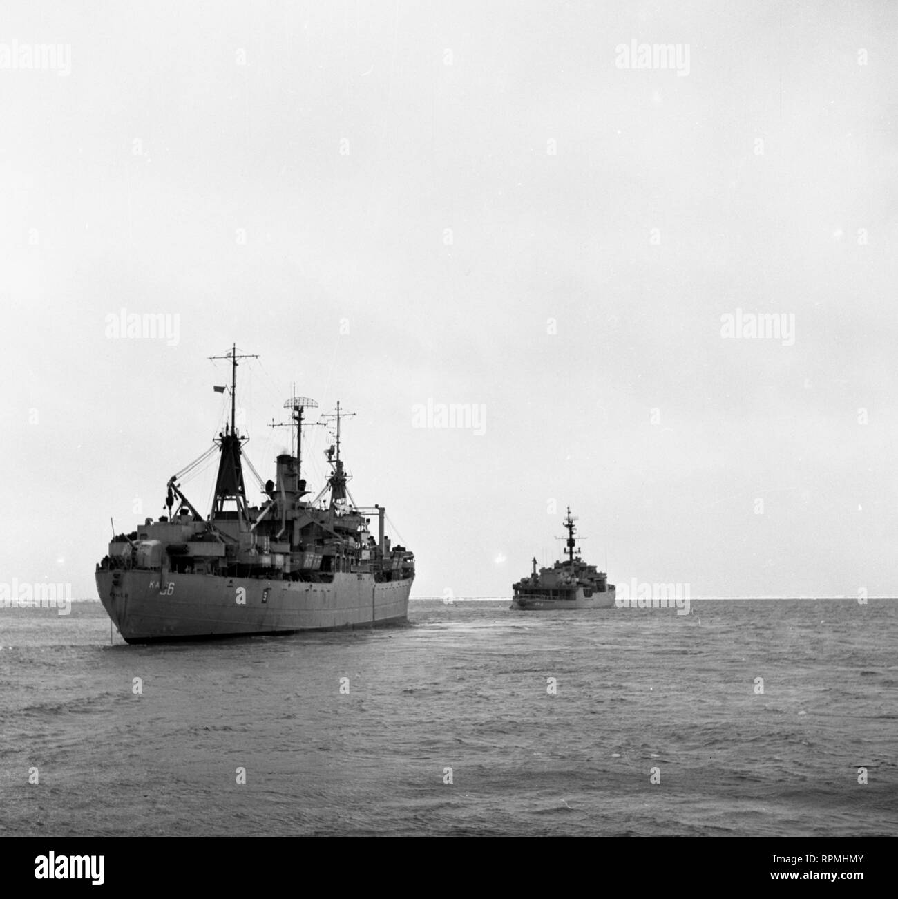 Operation Deep Freeze I - 1955 / 1956  - USA Task Force 43 - USS Arneb AKA-56 and USS Glacier AGB-4 Stock Photo