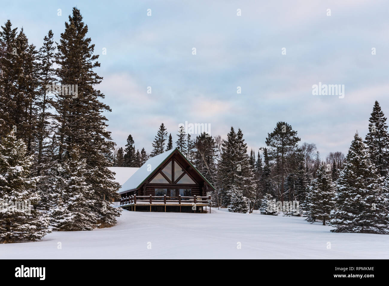 A Wooden Cabin In Snow Covered Pine Forest Duluth Minnesota Usa