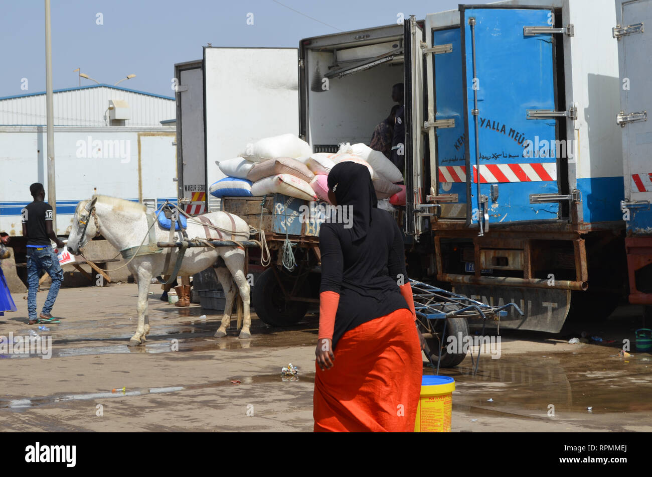 Trucks at the parking lot of Mbour fish market Stock Photo Alamy