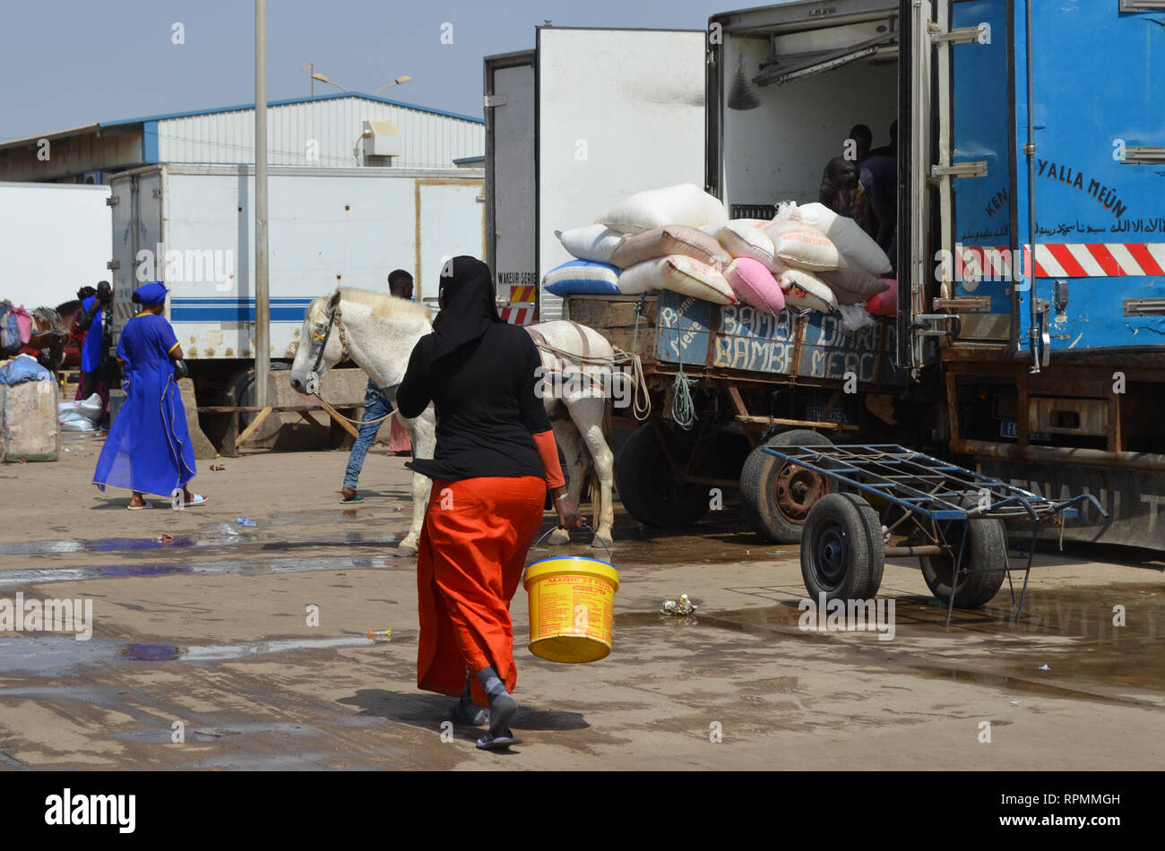 Trucks at the parking lot of Mbour fish market Stock Photo Alamy