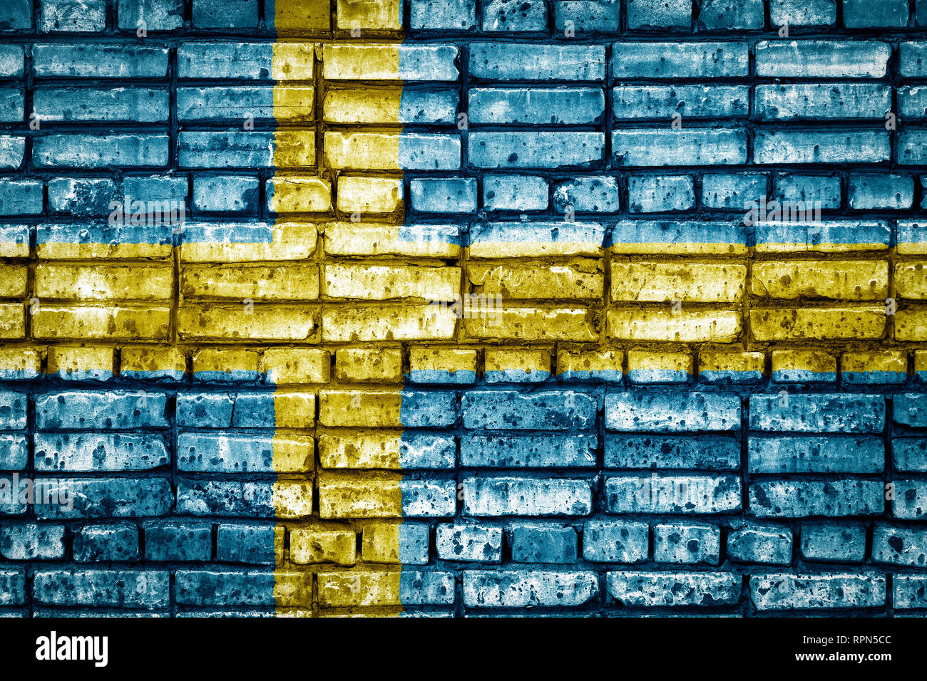 National flag of Sweden on a brick background. Concept image for Sweden: language , people and culture. Stock Photo