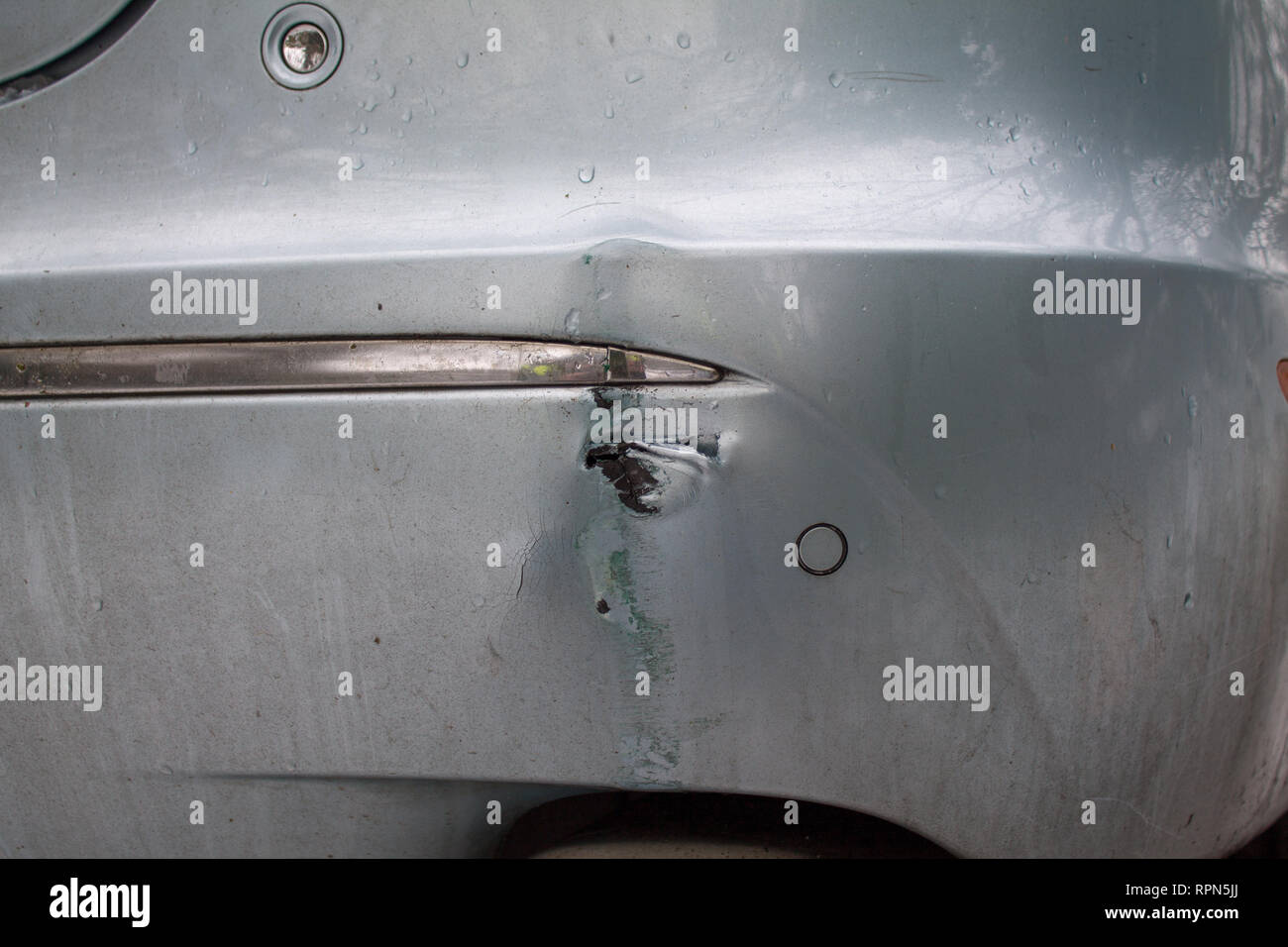 Road traffic accident Damage to rear bumper after a car crash in the