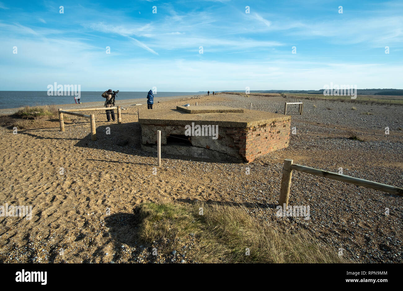 Half buried WW2 pillbox on Cley next the Sea beach, Norfolk, Uk Stock Photo