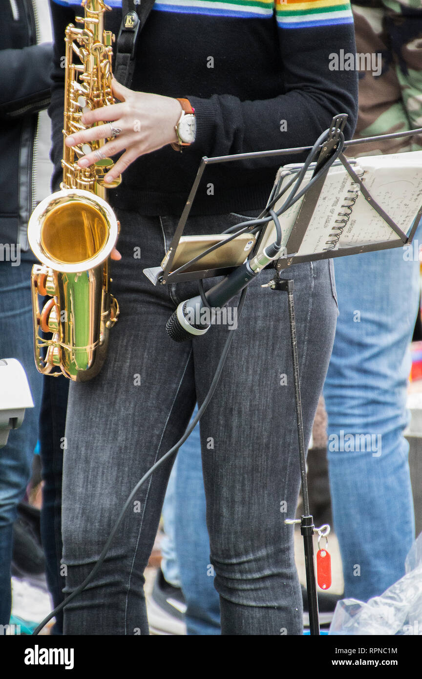 Girl playing saxophone hi-res stock photography and images - Alamy