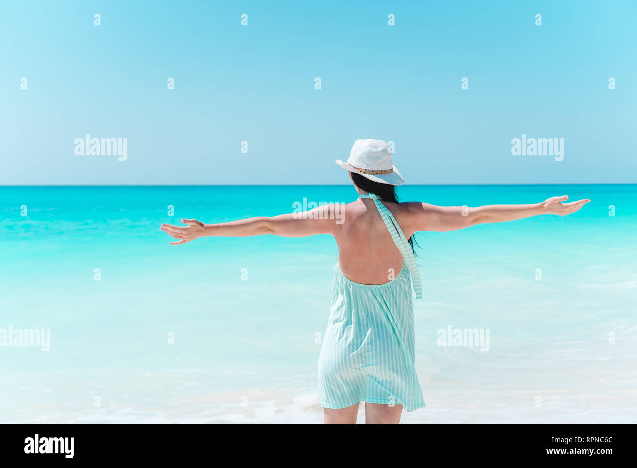 Young beautiful woman on beach vacation on Caribs Stock Photo - Alamy