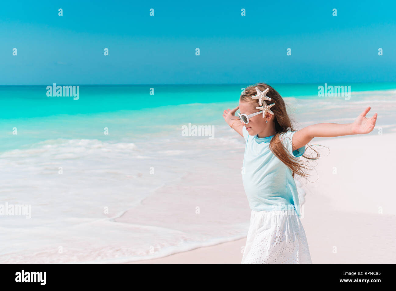 Cute little girl at beach during summer vacation Stock Photo Alamy