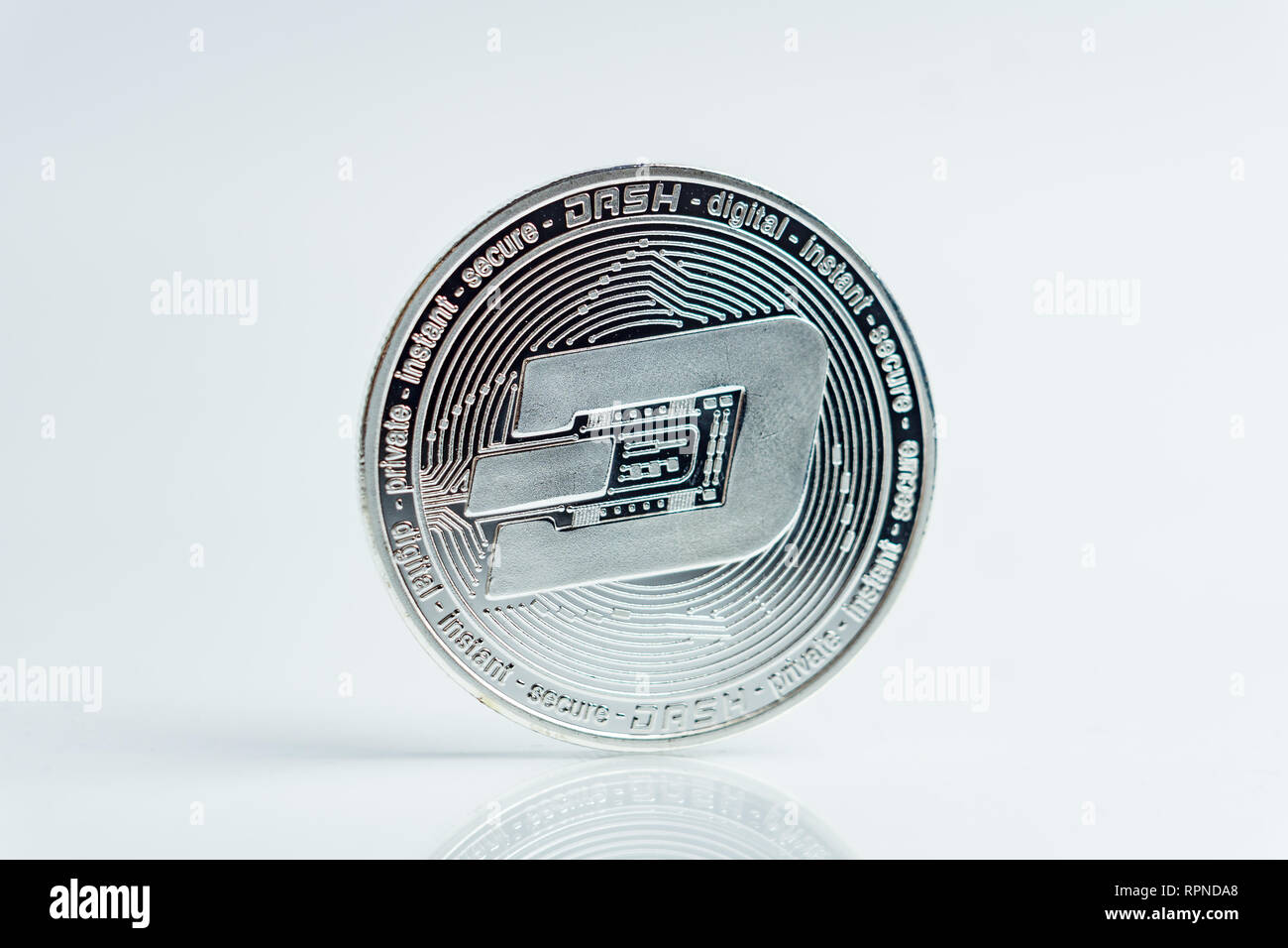 Dash. Crypto currency silver coin, Macro shot of Dash coin isolated on  white background, cut out Blockchain technology Stock Photo - Alamy