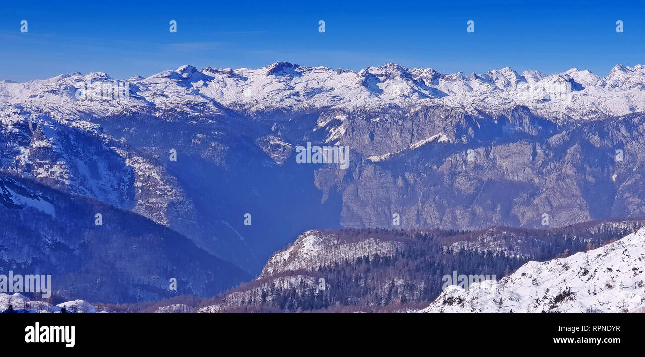 Panoramic view of the snowy mountains ski resort Vogel in Slovenia Stock Photo