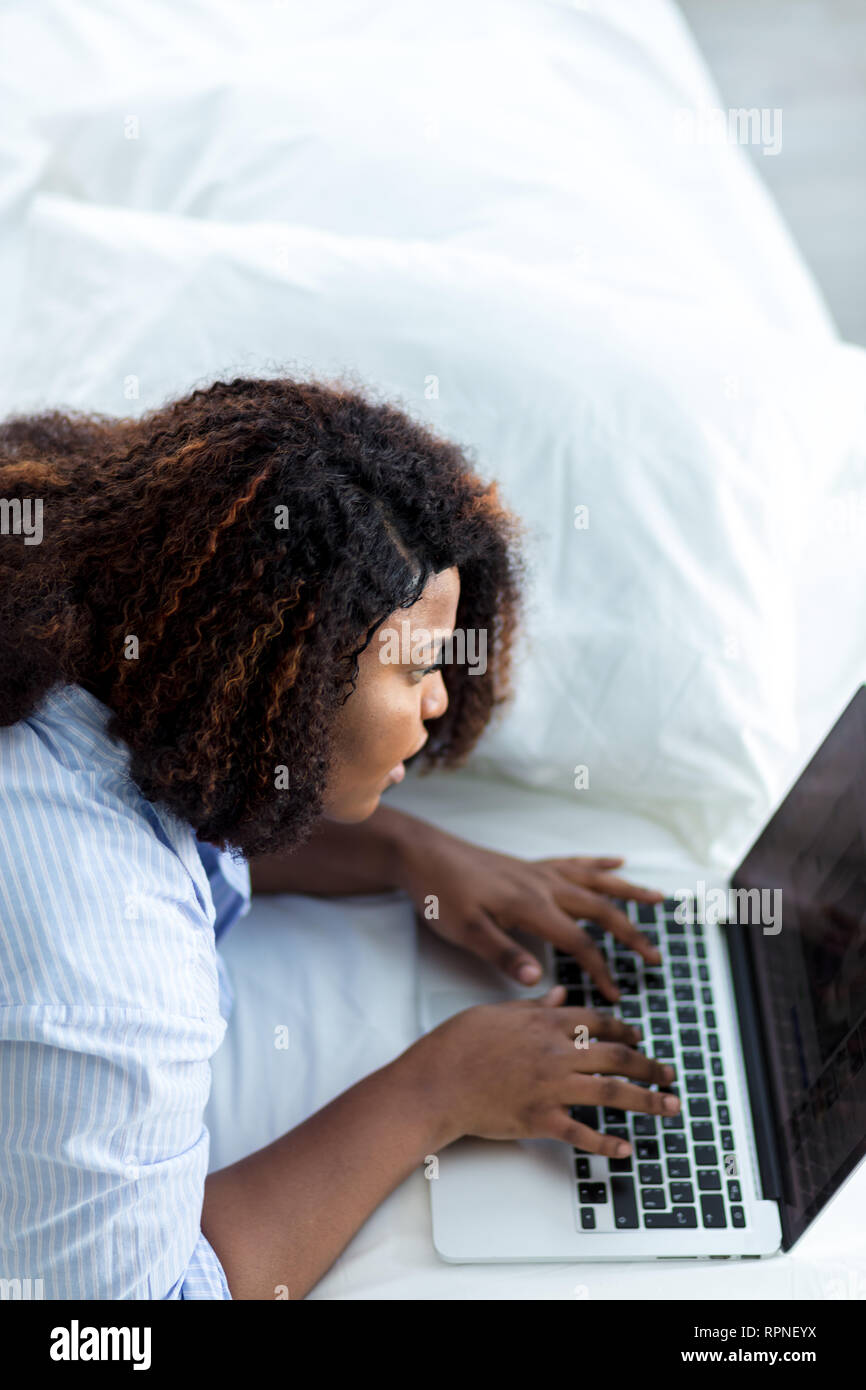 woman concentrated on typing messages. close up side view photo. wi-fi ...