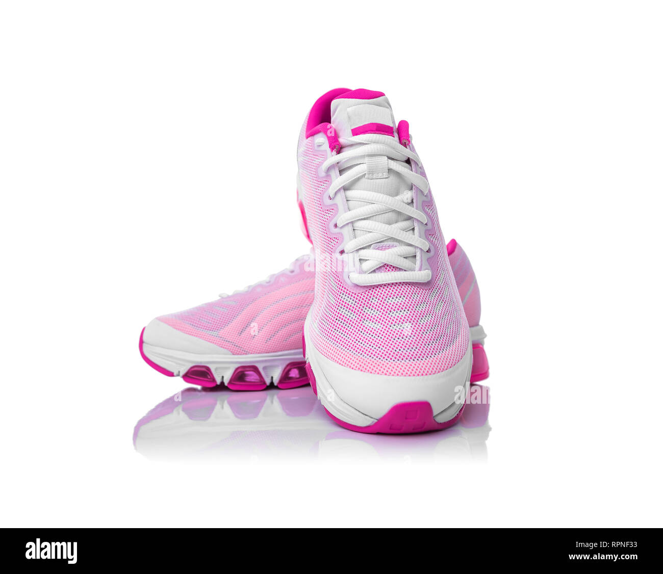 Pink sport shoes on white background Stock Photo - Alamy