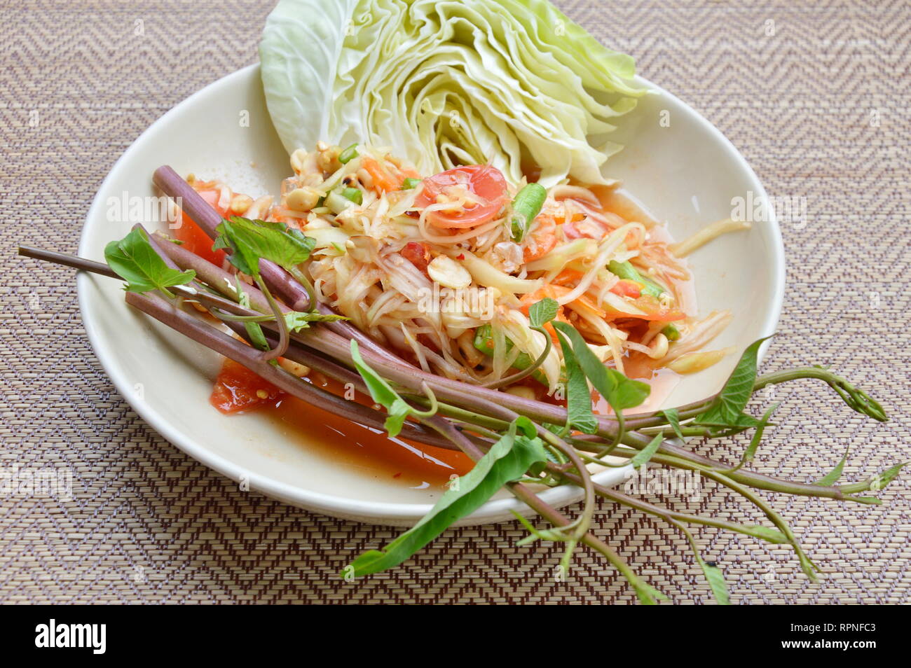 papaya salad taste spicy sweet and sour food Stock Photo Alamy
