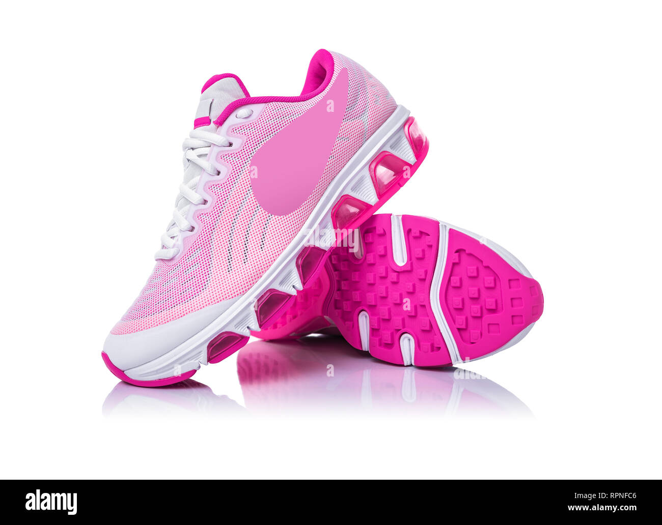Pink sport shoes on white background Stock Photo Alamy