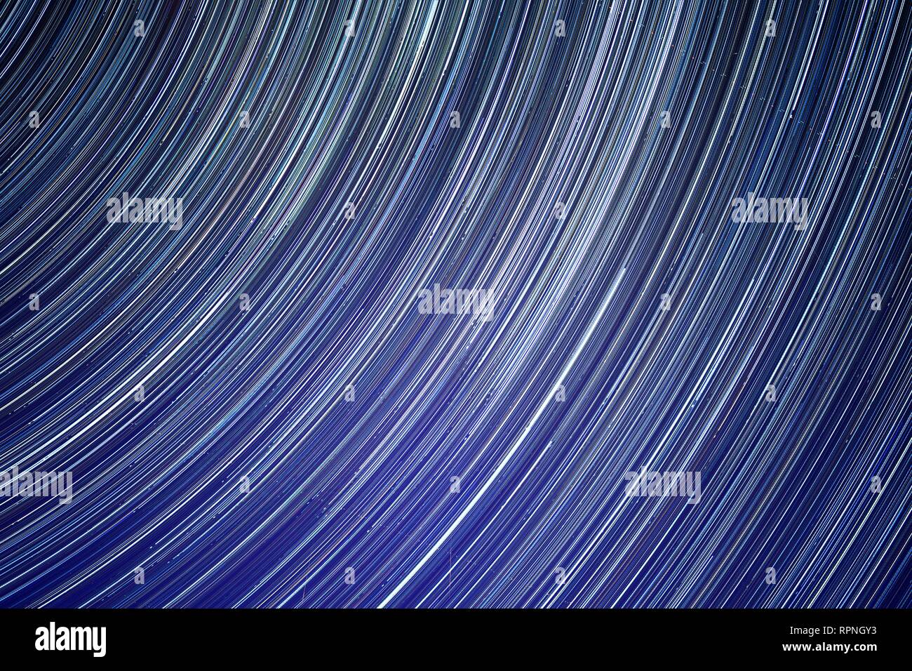 Stars trails on night sky Stock Photo - Alamy