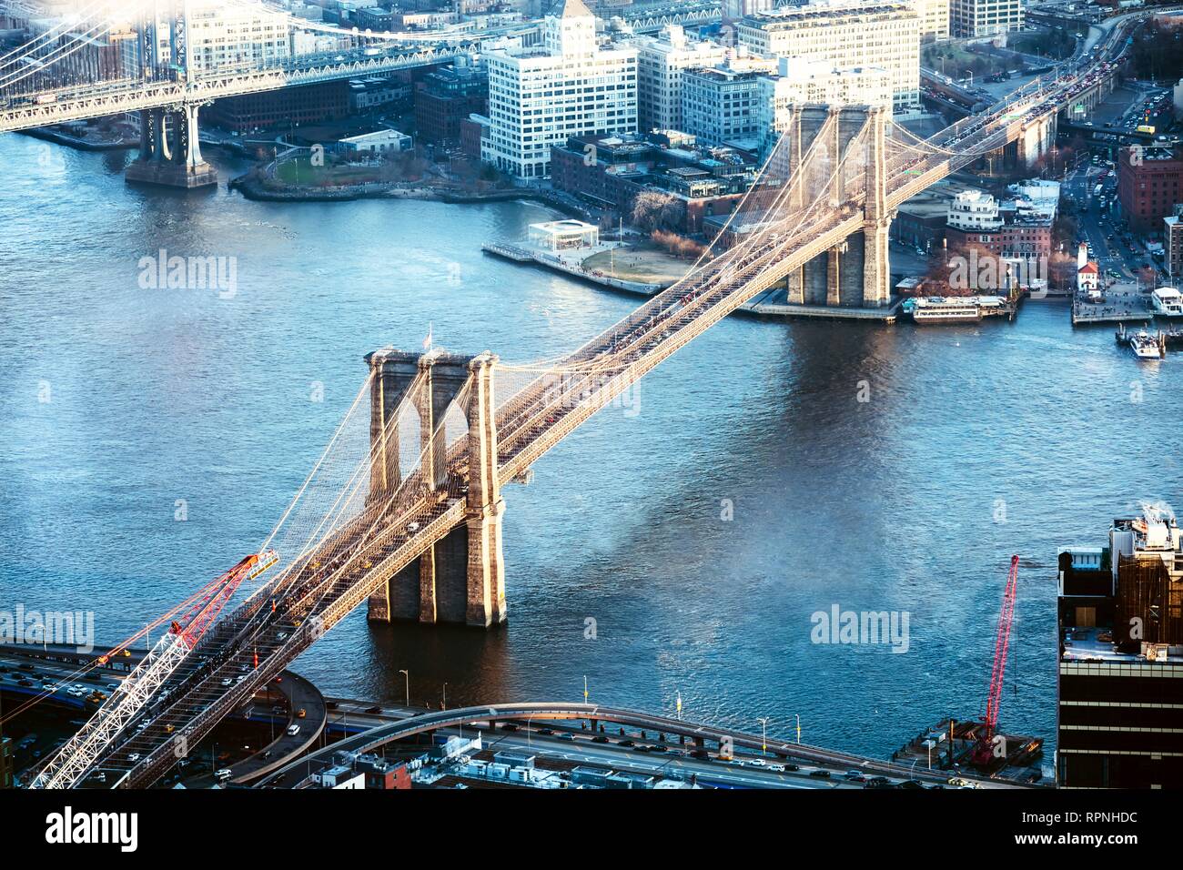 High Angle View Of Brooklyn Bridge Over East River With New York Cityscape Stock Photo