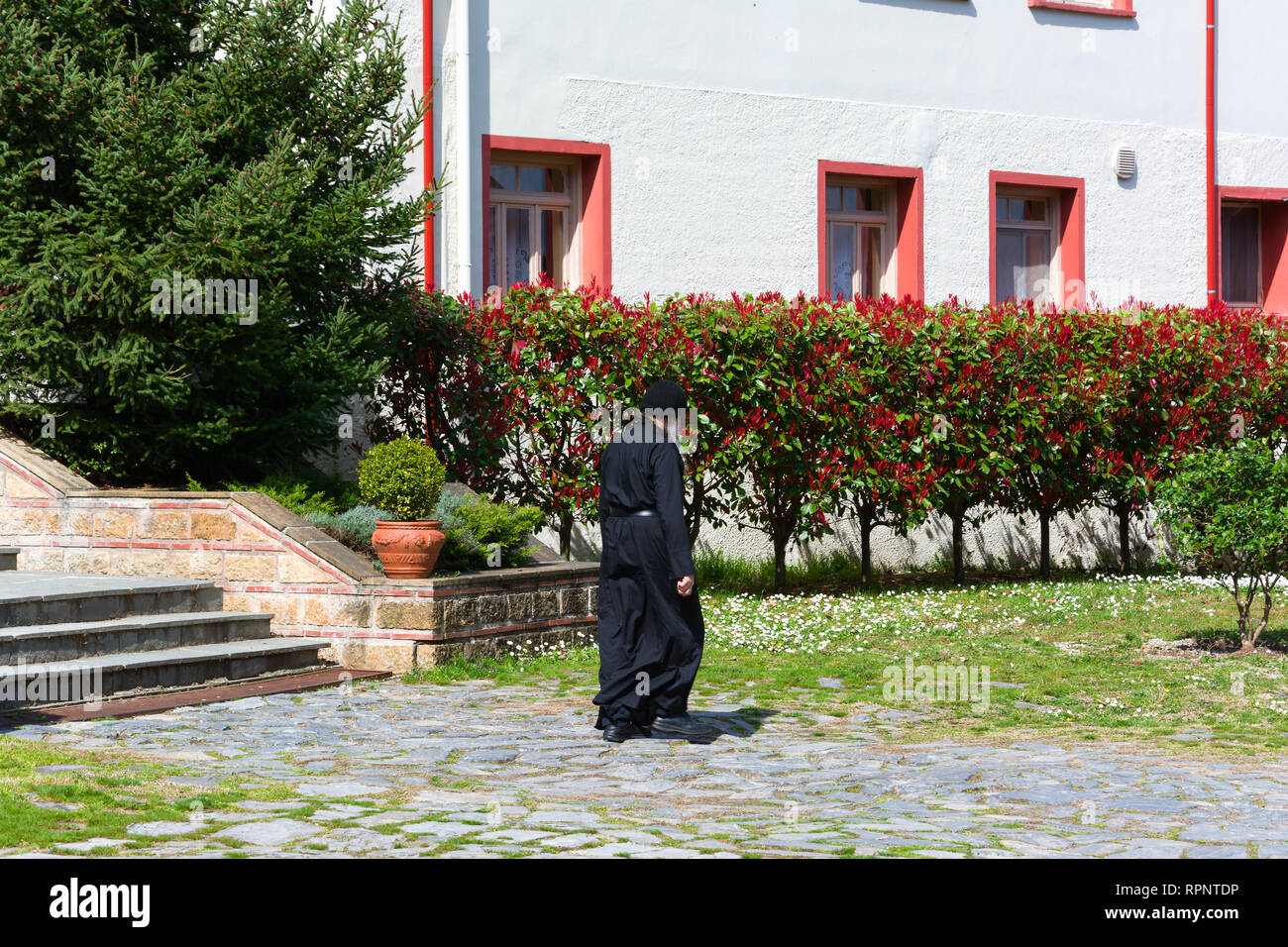 LITOCHORO, GREECE - APRIL 12, 2015: A monk in Monastery of Saint Dionysius of Mount Olympus, Litochoro, Greece. Stock Photo