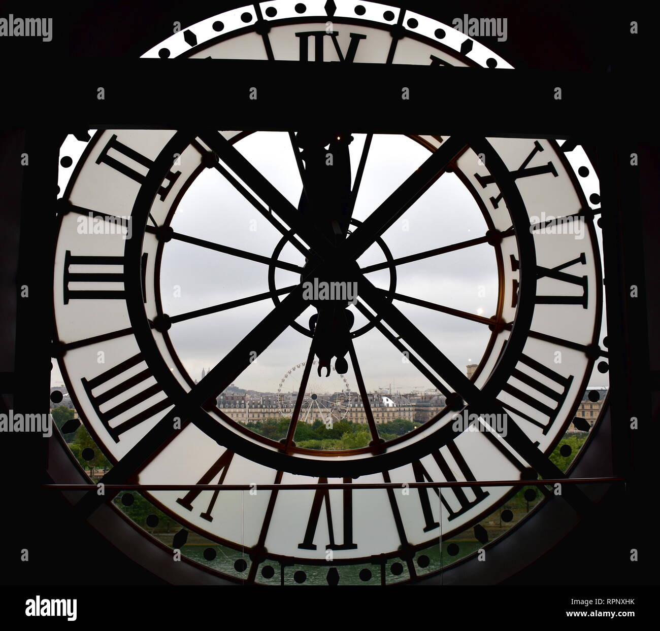 Big window clock at the Orsay Museum (Musee d Orsay) with Tuileries ...