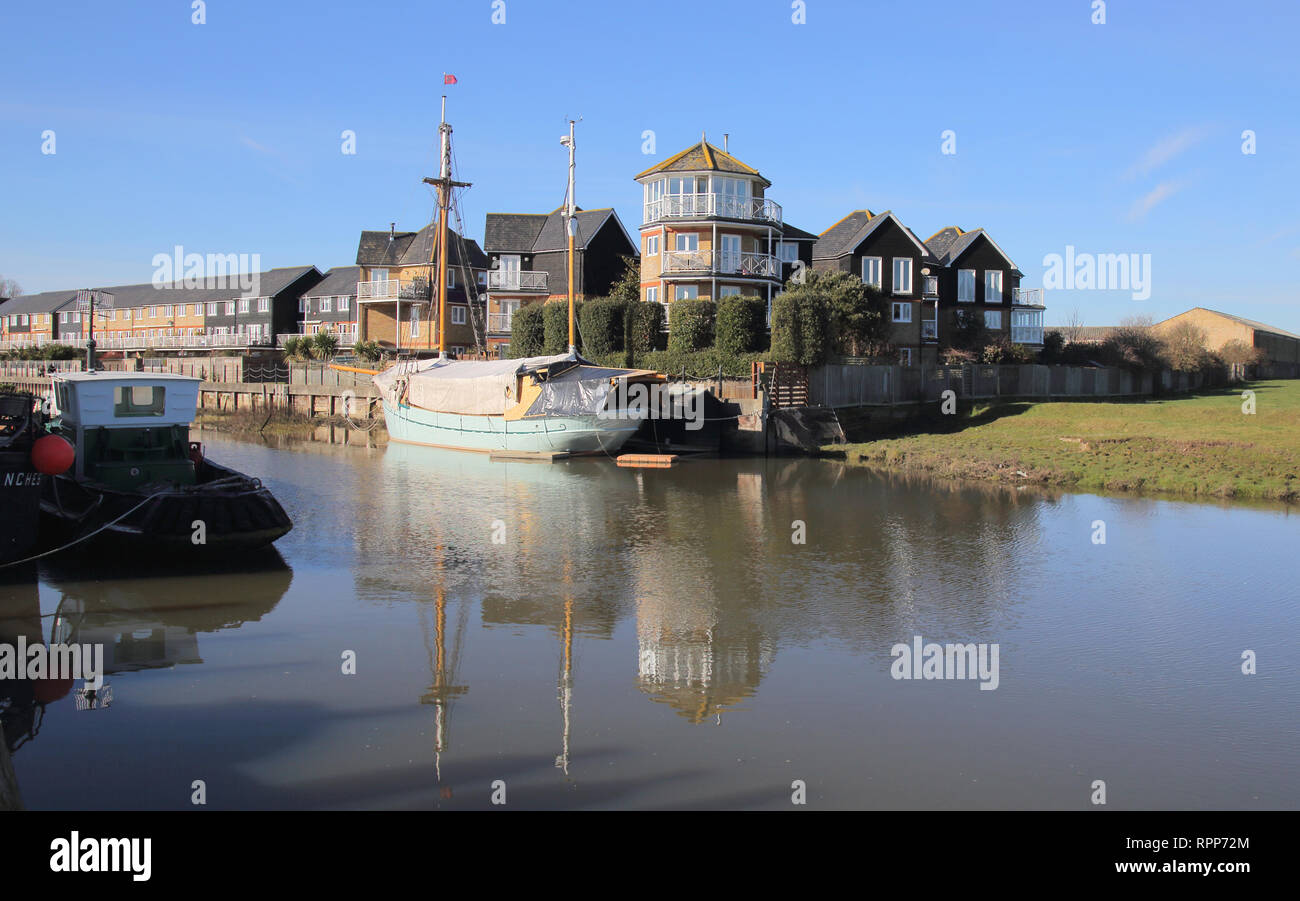 boats moored along faversham creek kent Stock Photo Alamy