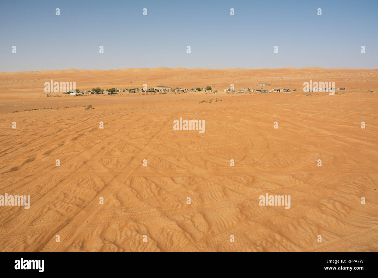 Wahiba Sand Desert and Bedouin camp in the morning (Oman) Stock Photo