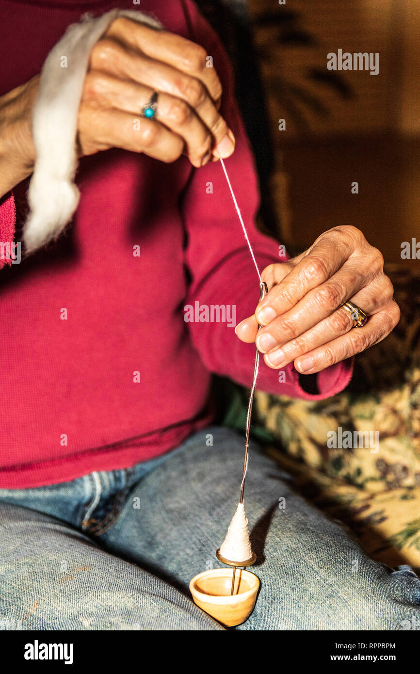 Hand spinning cotton hi-res stock photography and images - Alamy