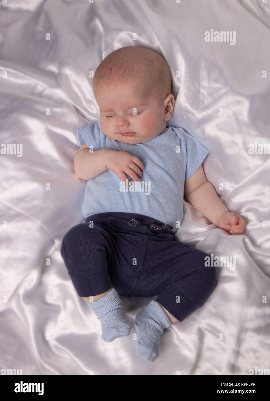 Sleeping baby boy, aged 7 weeks. Stock Photo