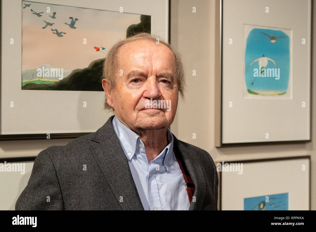 18 February 2019, Lower Saxony, Hannover: Hans Traxler, co-founder of the satirical magazines 'Pardon' and 'Titanic', stands in front of some of his illustrations, which are exhibited in the Museum für Karikatur und Zeichenkunst 'Wilhelm Busch'. Photo: Raphael Knipping/dpa Stock Photo