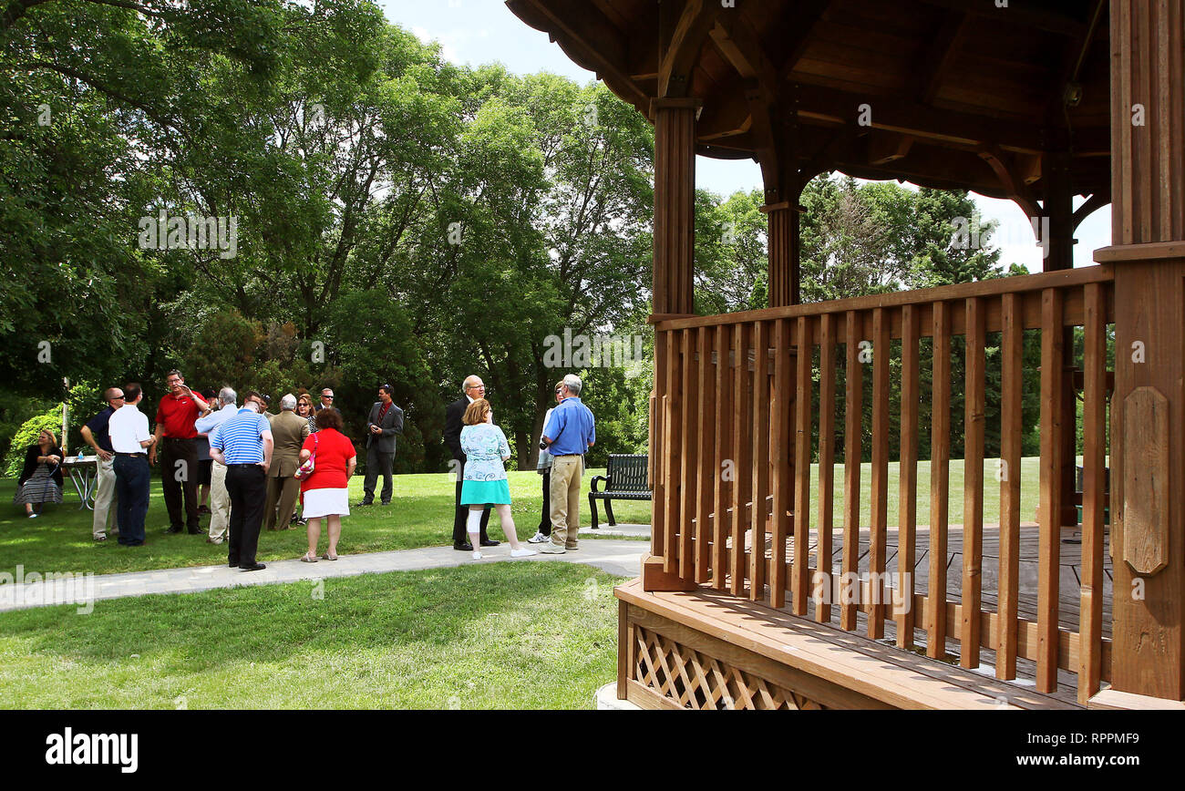 Bettendorf, Iowa, USA. 23rd June, 2016. Officials from the City of Bettendorf, Isle of Capri and Goldstein family members attended a short dedication ceremony for the gazebo that was donated to the City by the Isle of Capri, in memory of Bernie Goldstein Thursday, June 23, 2016. The structure was located on the Isle property until the construction of the new land based casino. The gazebo was relocated to Middle Park in May. Credit: Kevin E. Schmidt/Quad-City Times/ZUMA Wire/Alamy Live News Stock Photo