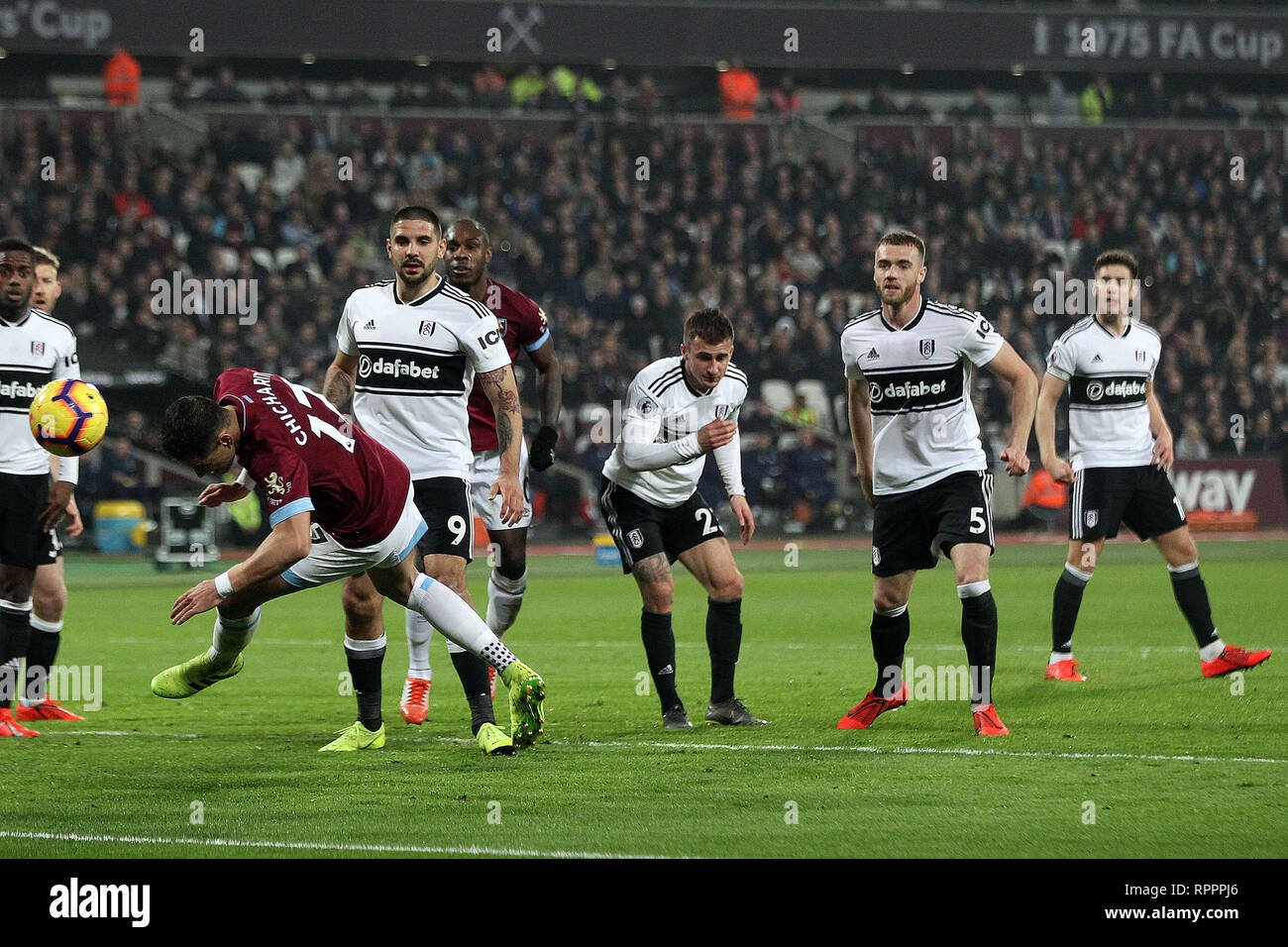 London, UK. 22nd Feb, 2019. Javier Hernandez of West Ham United (L) scores his team's first goal. Premier League match, West Ham United v Fulham at the London Stadium, Queen Elizabeth Olympic Park in London on Friday 22nd February 2019. this image may only be used for Editorial purposes. Editorial use only, license required for commercial use. No use in betting, games or a single club/league/player publications . pic by Steffan Bowen/Andrew Orchard sports photography/Alamy Live news Credit: Andrew Orchard sports photography/Alamy Live News Stock Photo