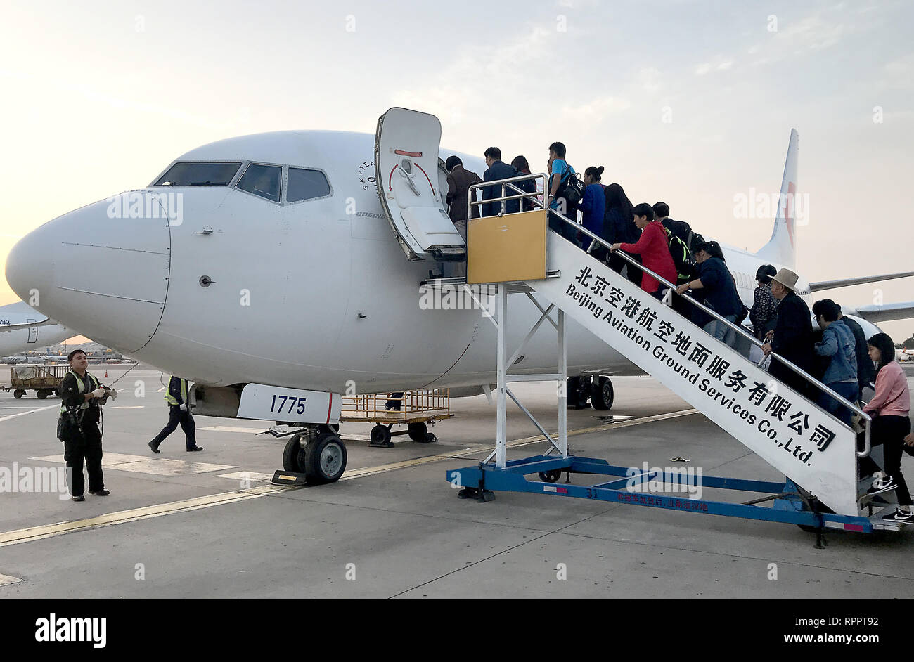Beijing China th Oct 18 Chinese Passengers Board A Passenger Jet Parked On Beijing S International Airport