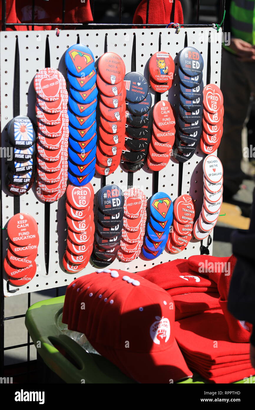 DeFremery Park, Oakland, California, USA February 22, 2019  Vendors sell pins and hats to support Oakland teachers at strike rally.  OUSD, Oakland Unified School District Teachers are striking for better pay, smaller classrooms, more support for students and against privatization of schools.   Credit: Caryn Becker/Alamy Live News Stock Photo