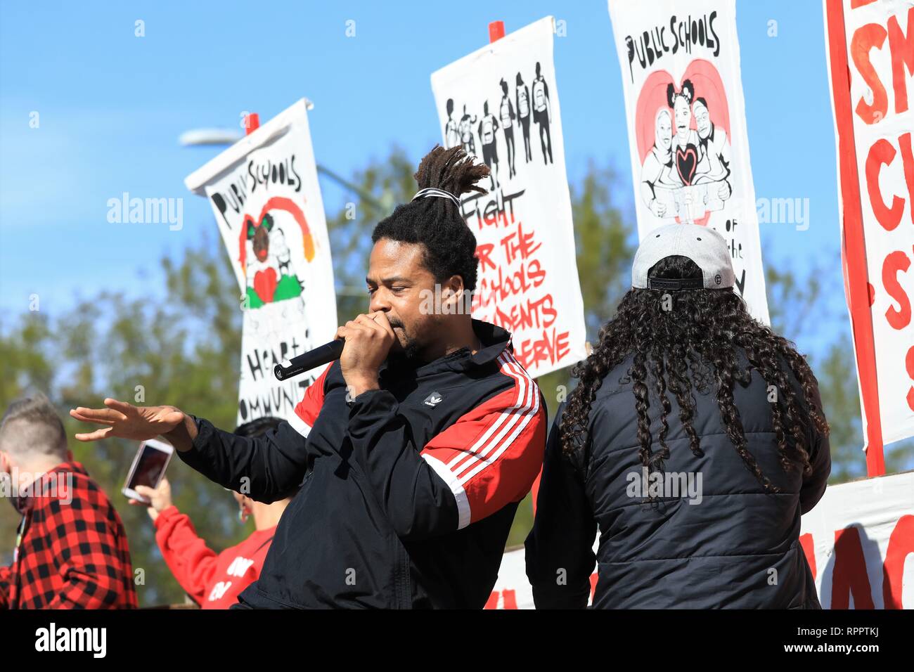 DeFremery Park, Oakland, California, USA February 22, 2019  Hip hop group Zion I with Baba Zumbi performs in support of Oakland teachers.    OUSD, Oakland Unified School District Teachers are striking for better pay, smaller classrooms, more support for students and against privatization of schools.   Credit: Caryn Becker/Alamy Live News Stock Photo