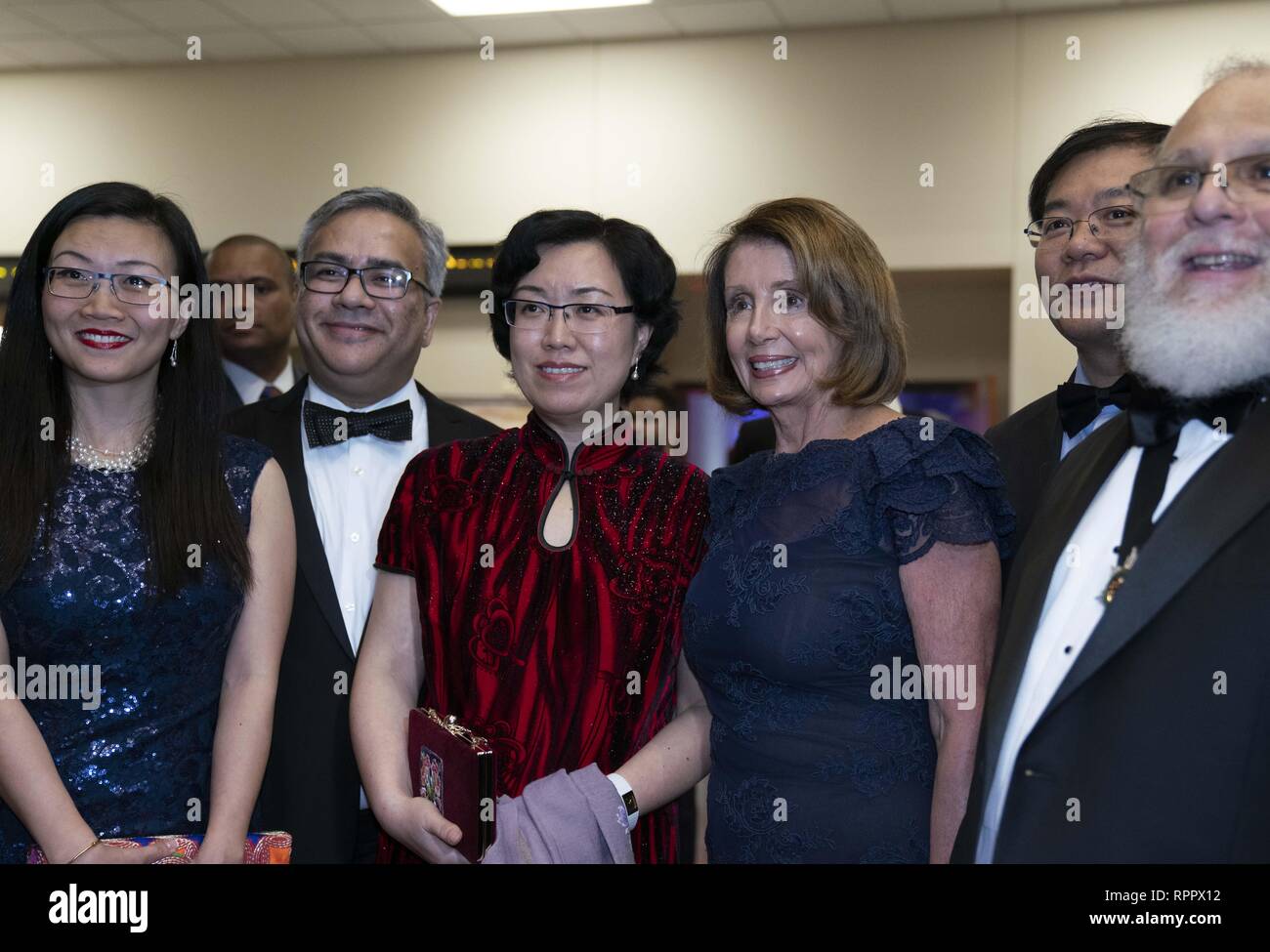 Laredo, TX, USA. 22nd Feb, 2019. Laredo, Texas Feb. 22, 2019: House Speaker Nancy Pelosi poses with guests at the Los Caballeros de la Republica del Rio Grande cocktail party as an honored guest of the George Washington's Birthday celebration in this border city. Pelosi toured the Rio Grande River earlier in the day. Credit: Bob Daemmrich/ZUMA Wire/Alamy Live News Stock Photo