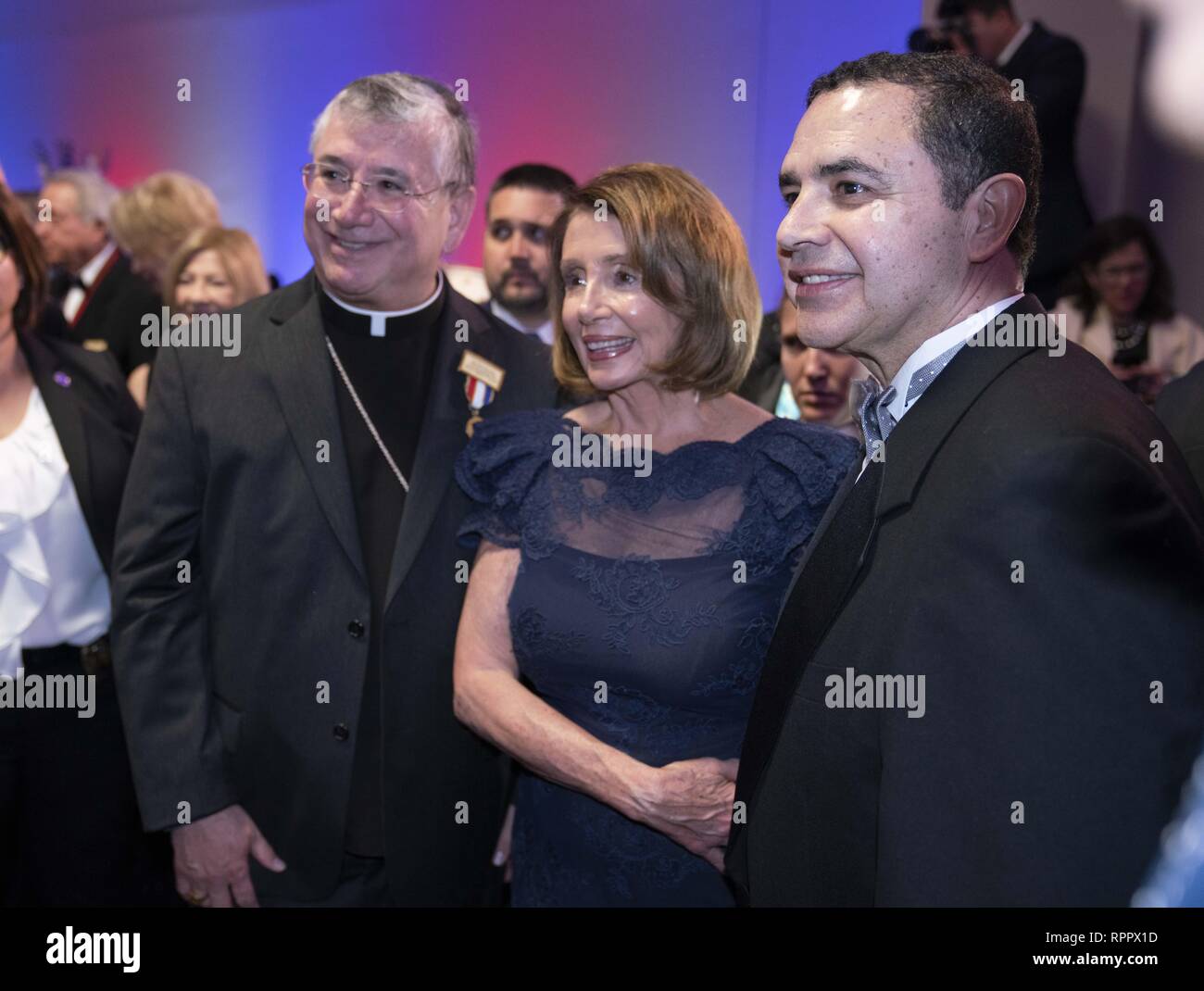 Laredo, TX, USA. 22nd Feb, 2019. Laredo, Texas Feb. 22, 2019: House Speaker Nancy Pelosi poses with guests at the Los Caballeros de la Republica del Rio Grande cocktail party as an honored guest of the George Washington's Birthday celebration in this border city. Pelosi toured the Rio Grande River earlier in the day. At right is Congressman Henry Cuellar, D-Laredo. Credit: Bob Daemmrich/ZUMA Wire/Alamy Live News Stock Photo