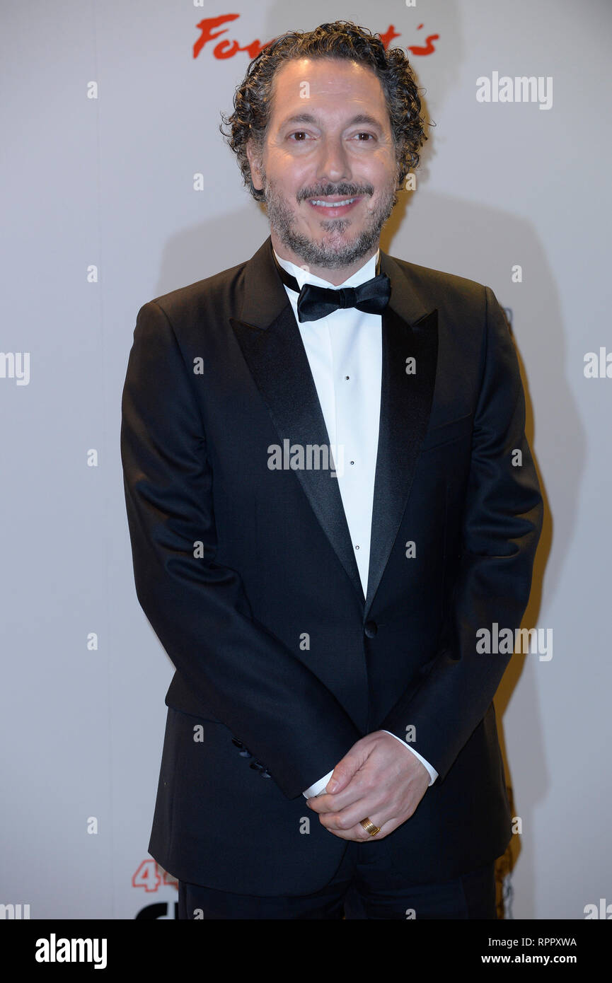 Guillaume Gallienne poses in the Fouquet's restaurant after the 44th Cesar Awards Ceremony at Salle Pleyel. Stock Photo