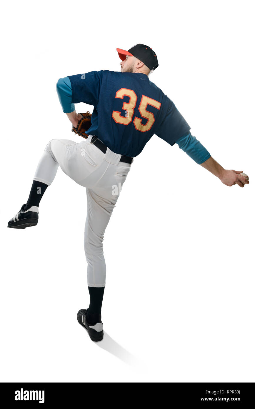 Baseball pitcher in action Stock Photo