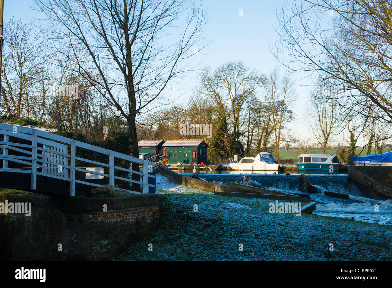 Dawn rises on a winter's morning at Paper Mill Lock, on the Chelmer and Blackwater Navigation (canal). Stock Photo