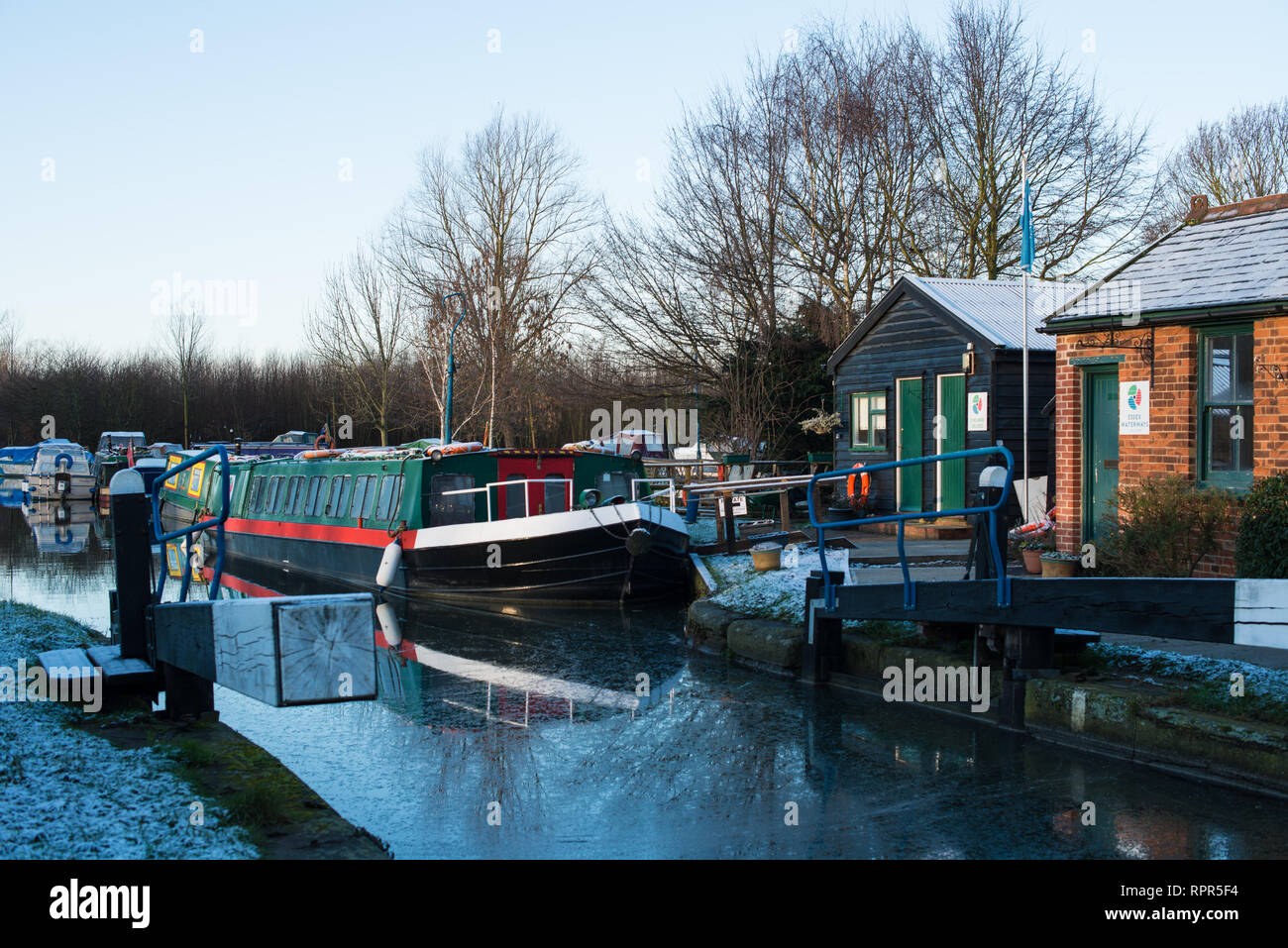Dawn rises on a winter's morning at Paper Mill Lock, on the Chelmer and Blackwater Navigation (canal). Stock Photo
