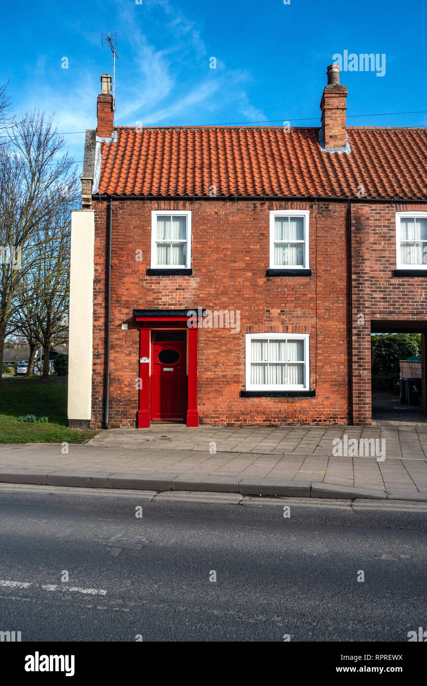 English Village Red Brick detached house with Red Door in Market Place