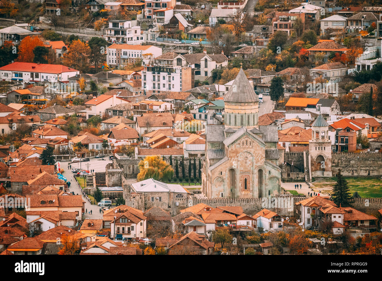 Mtskheta Georgia. Top View Of Ancient Town And Svetitskhoveli Cathedral During Autumn Day. UNESCO World Heritage Site Stock Photo