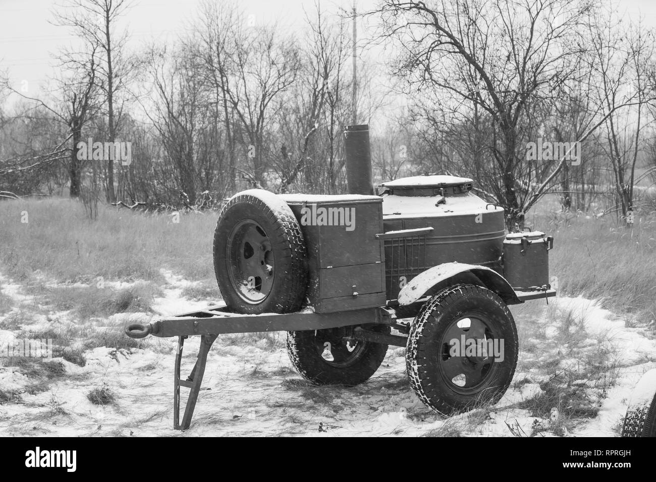 Russian Soviet World War II Field Kitchen In Winter Forest. WWII Equipment Of Red Army. Mobile Kitchen, Mobile Canteens Or Food Truck Stock Photo