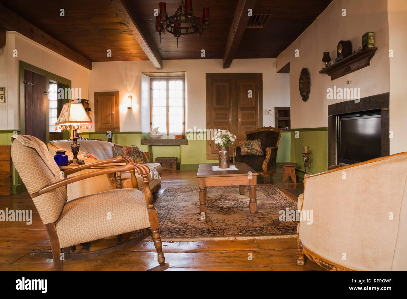 Living Room With Antique Furnishings In An Old Circa 1850 Canadiana Cottage Style Fieldstone Home Stock Photo Alamy