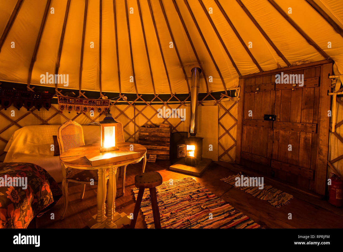 Cosy yurt interior - glamping in Sussex Stock Photo