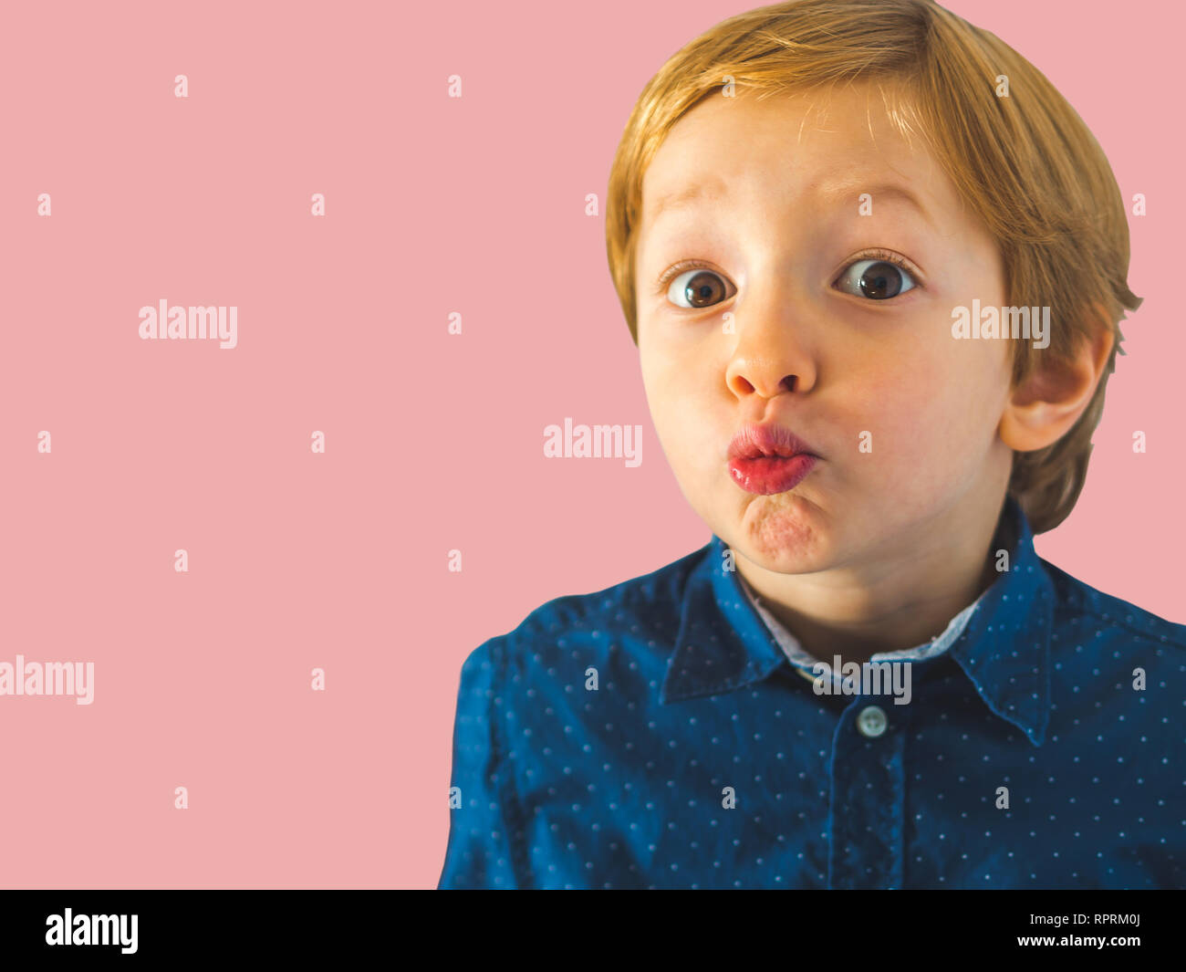 Little Funny Blonde 5 Year Old Boy Isolated On Pink Background Stock Photo Alamy
