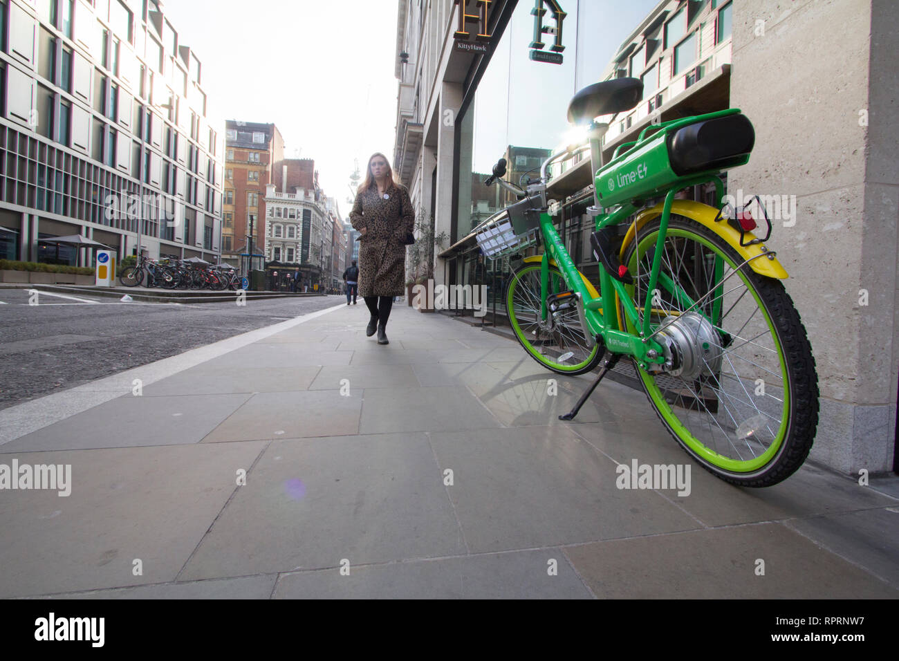 Lime electric bike on pavement hires stock photography and images Alamy