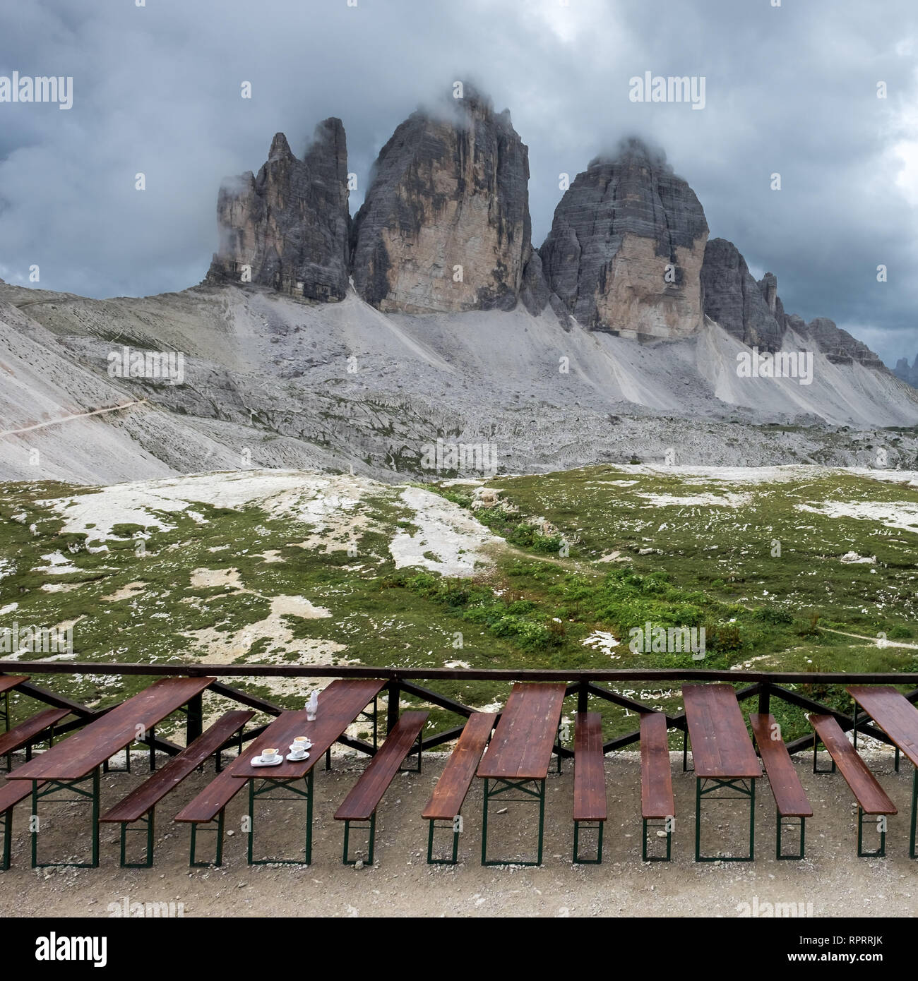 Coffee cups on a table with mighty Tre Cime peaks in the background Stock Photo