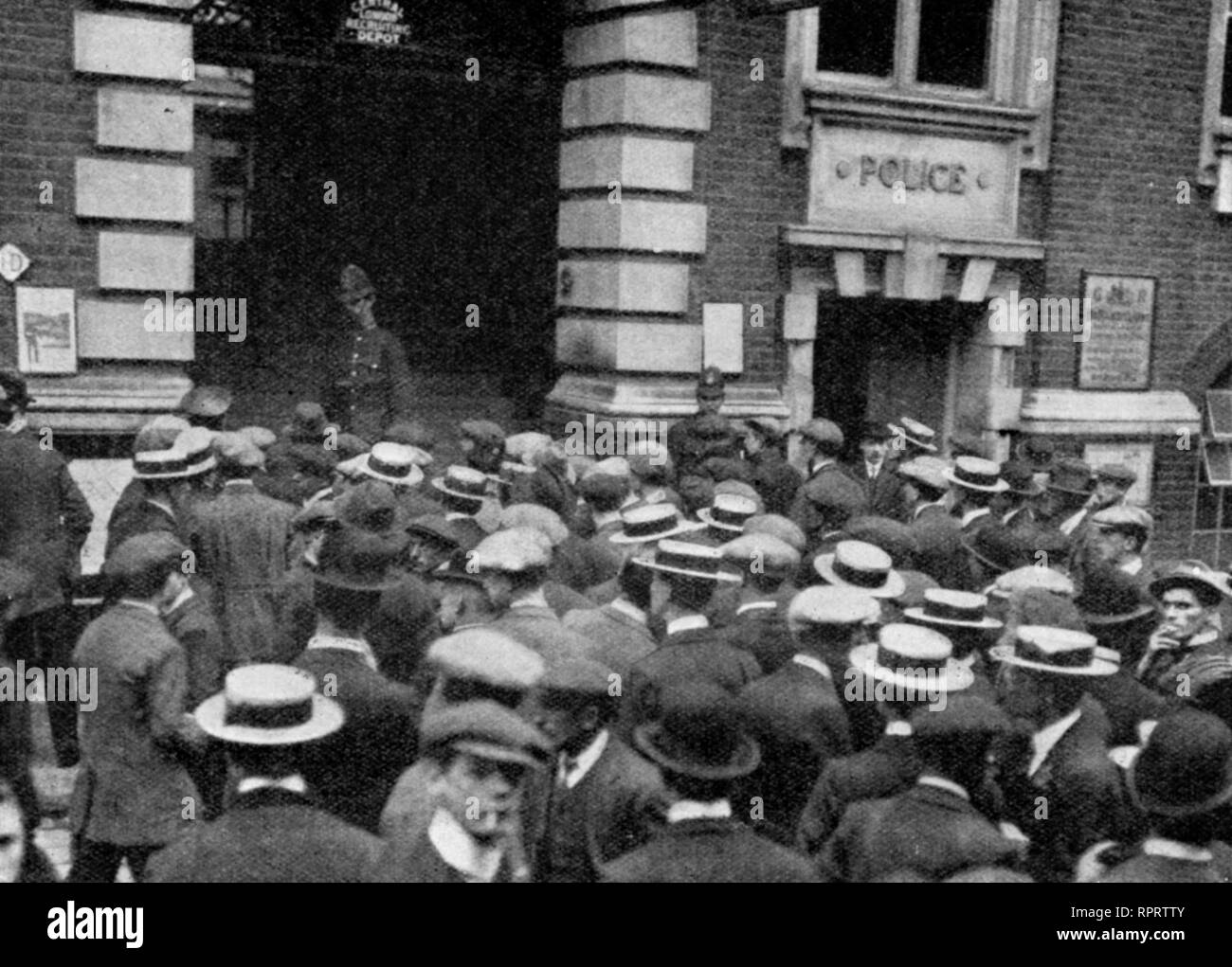 A queue outside the Central London Recruiting Depot at New Scotland Yard in August 1914. The response to Lord Kitchener's appeal. At the beginning of 1914 the British Army had a reported strength of 710,000 men including reserves, of which around 80,000 were regular troops. By the end of the First World War almost 1 in 4 of the total male population of the United Kingdom had joined up, over five million men. Stock Photo