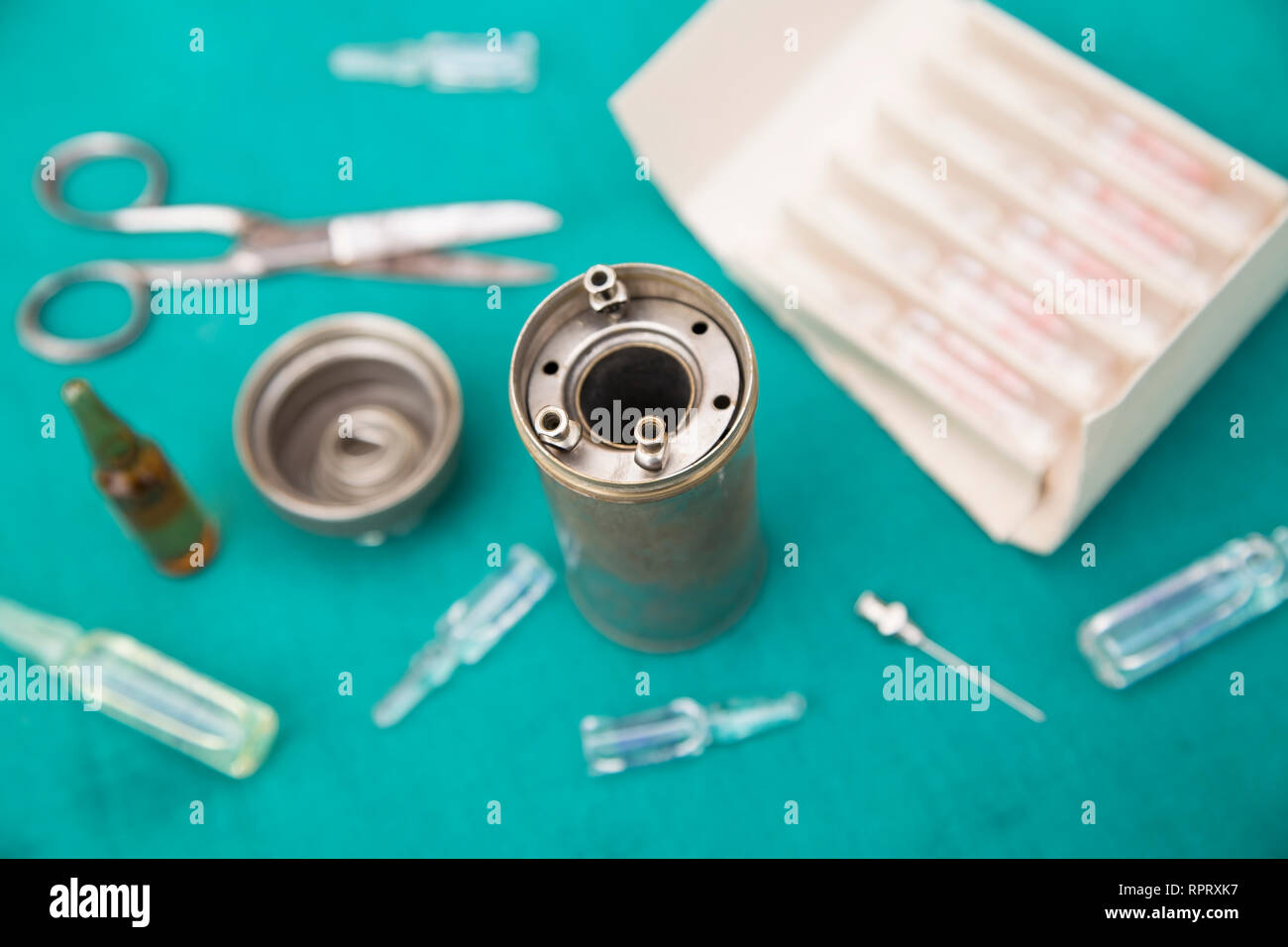 Antique medical tools on green cotton cloth Stock Photo Alamy