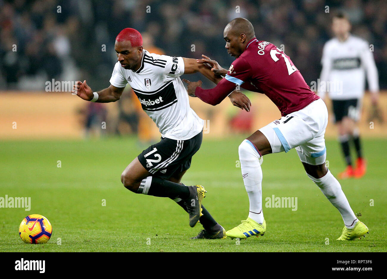 Fulham S Ryan Babel Left And West Ham United S Angelo Ogbonna Battle For The Ball During The Premier League Match At London Stadium Stock Photo Alamy