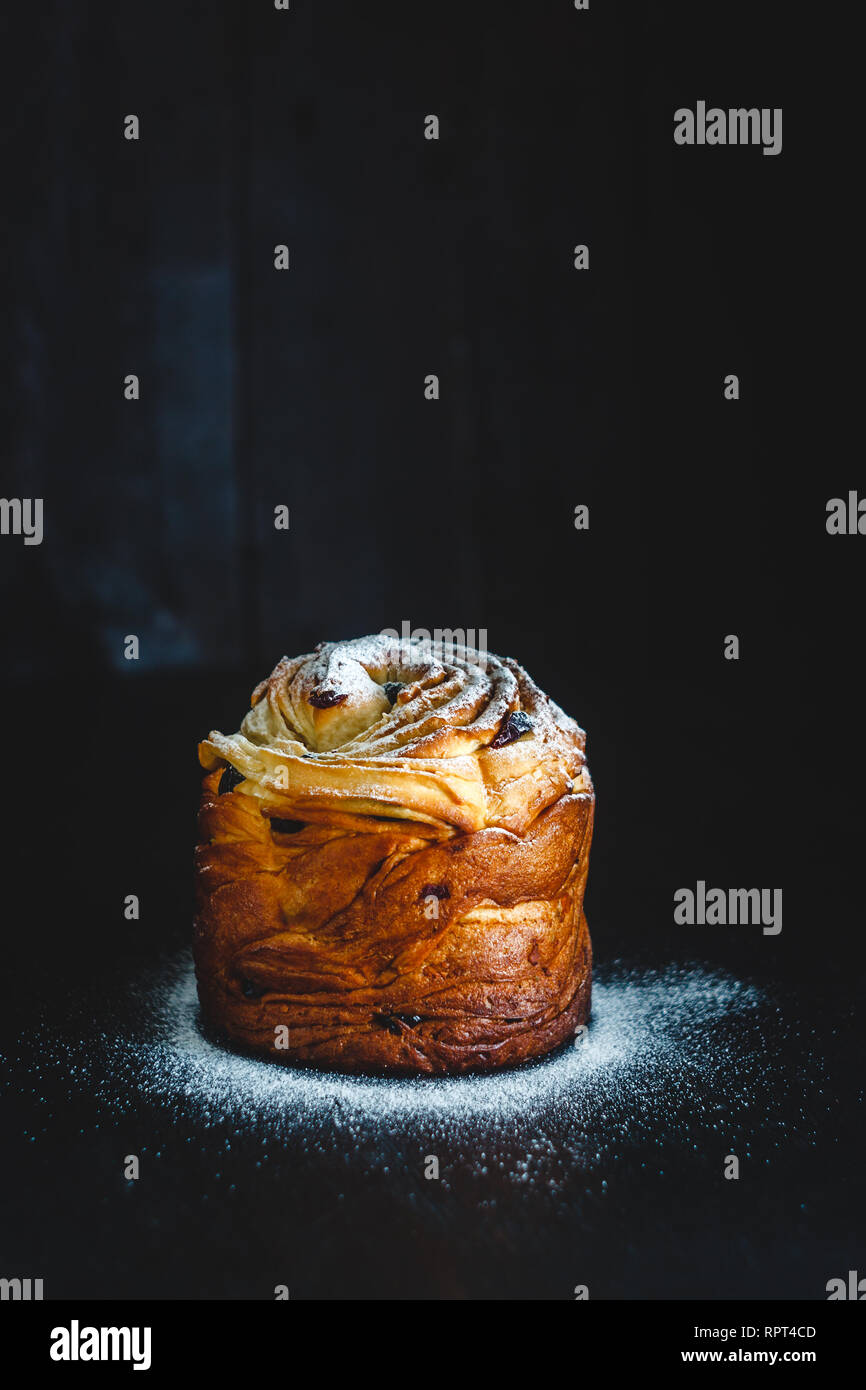 Easter cake kranch with icing sugar on a dark background. Stock Photo